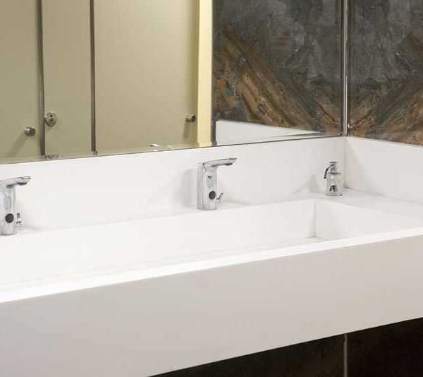 white-corian-benchtop-sink-in-bathroom
