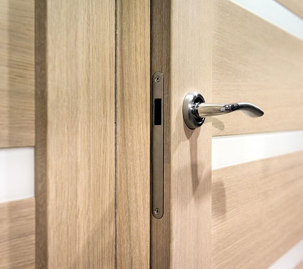 close-up-wooden-door-handle-and-frame